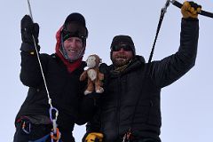 
Jerome Ryan, Dangles And Guide Josh Hoeschen Close Up On The Mount Vinson Summit
